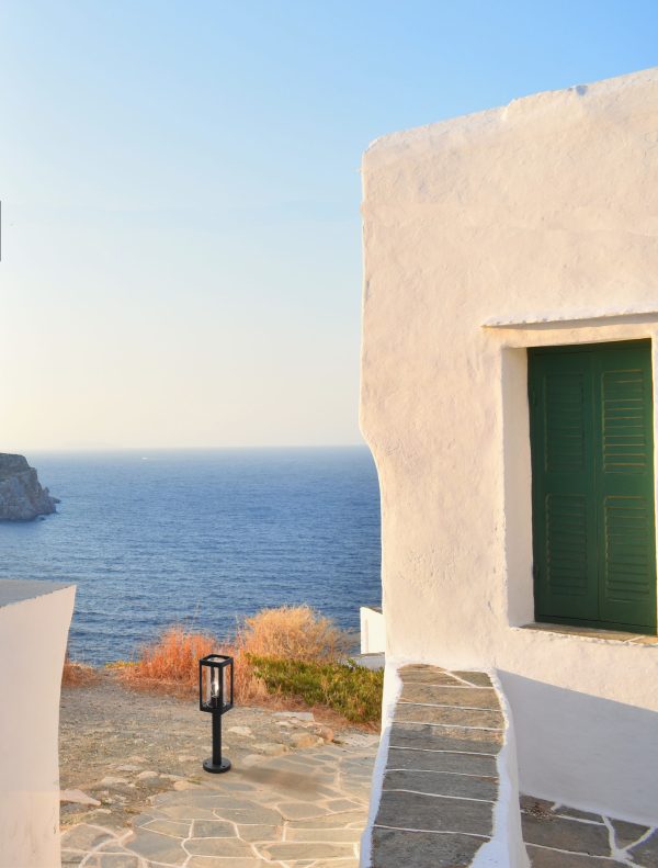 Greek,Island,And,White,Houses,In,Aegean,Blue,Backround